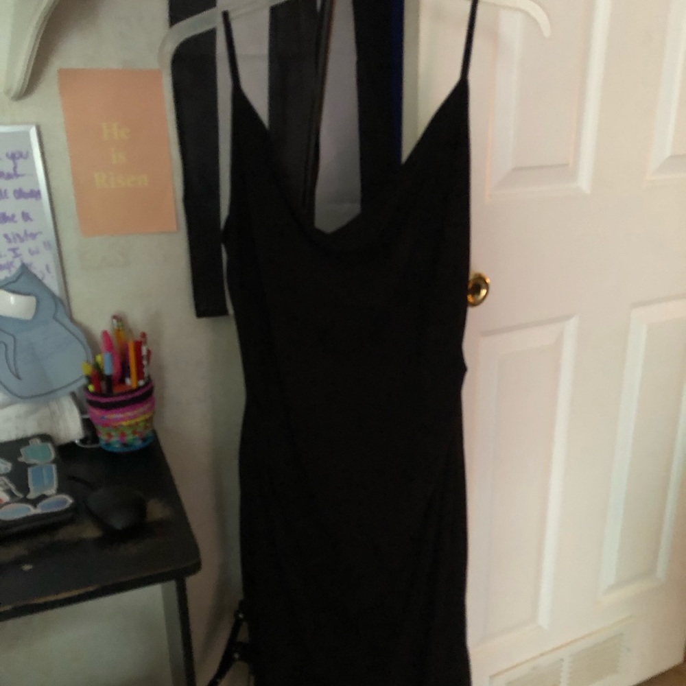 This is a black dress. It has not been worn.